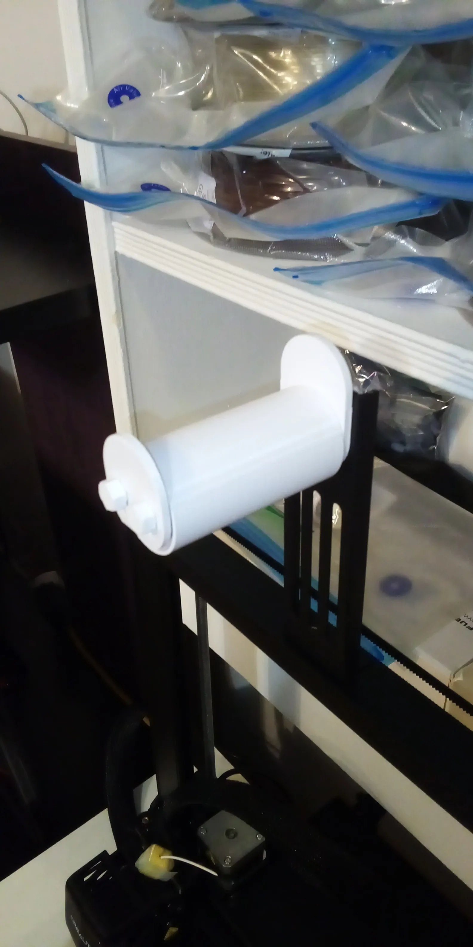 Image de présentation du modèle 3D imprimmable: Support de filament universel pour Ender avec Bearing 100% PLA.